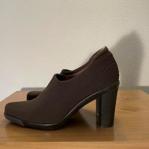 Donald Pliner microfiber pump with leather detail.